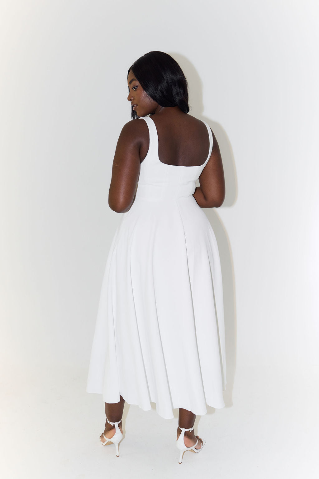 Grace’s Elegant Midi Dress with Flattering Silhouette and Versatile Design
