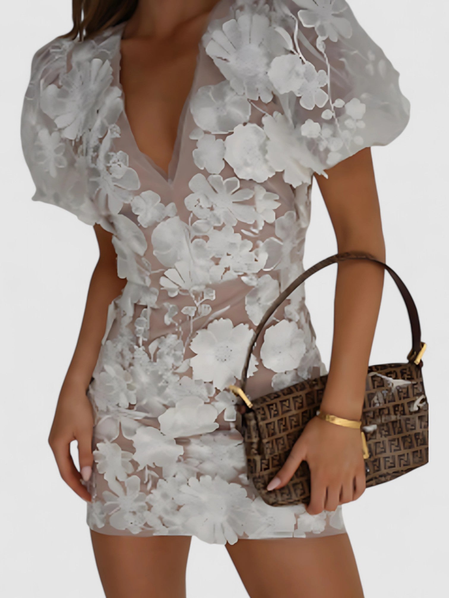 Amira’s Floral Mini Dress with Puff Sleeves and Flattering Fit