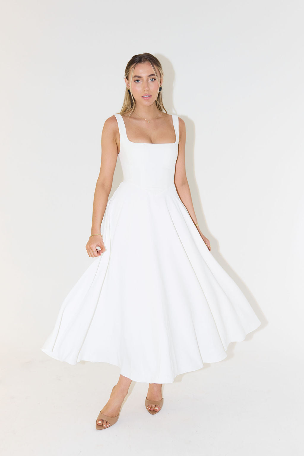 Grace’s Elegant Midi Dress with Flattering Silhouette and Versatile Design