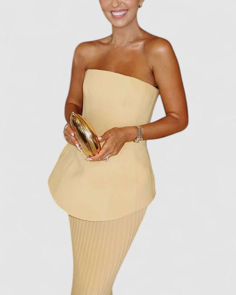 Noemi’s Strapless Maxi Dress with Flowing Silhouette and Elegant Design