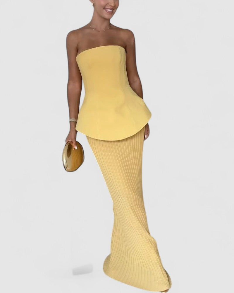 Noemi’s Strapless Maxi Dress with Flowing Silhouette and Elegant Design